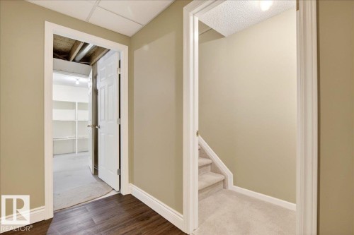 Corridor featuring baseboards and carpet floors - 13217 155 Avenue Nw, Edmonton, AB - Indoor Photo Showing Other Room