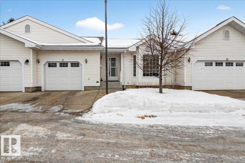 Single story home with an attached garage and driveway - 13217 155 Avenue Nw, Edmonton, AB - Outdoor With Facade