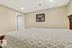 Bedroom featuring a paneled ceiling and recessed lighting - 