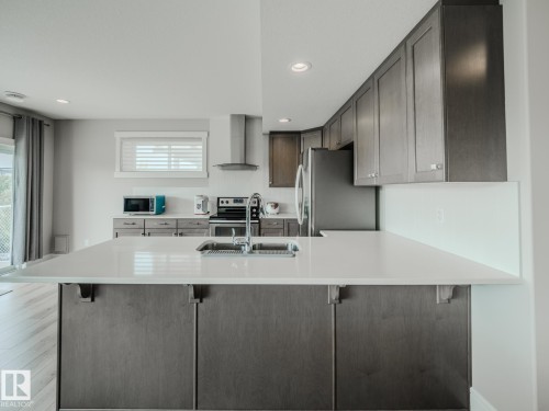 9756 222 Street, Edmonton, AB - Indoor Photo Showing Kitchen With Double Sink With Upgraded Kitchen