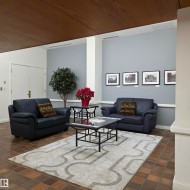 Living room featuring wood ceiling and baseboards - 