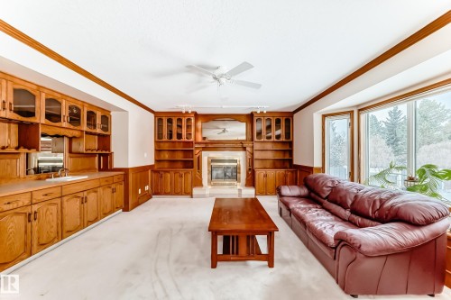 1720 Bearspaw Drive E, Edmonton, AB - Indoor Photo Showing Living Room With Fireplace