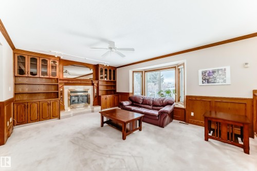 1720 Bearspaw Drive E, Edmonton, AB - Indoor Photo Showing Other Room With Fireplace