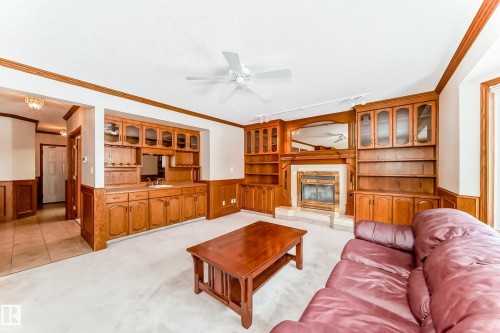 1720 Bearspaw Drive E, Edmonton, AB - Indoor Photo Showing Living Room With Fireplace
