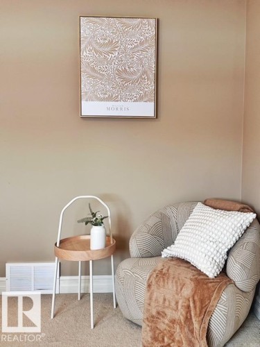 Sitting room with carpet flooring and baseboards - 12219 167A Avenue, Edmonton, AB - Indoor Photo Showing Bedroom