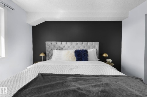 Bedroom featuring a mini split for heating / cooling - 502 7511 171 Street Nw, Edmonton, AB - Indoor Photo Showing Bedroom
