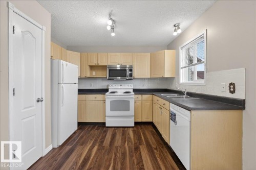 40 Birchglen Crescent, Leduc, AB - Indoor Photo Showing Kitchen With Double Sink