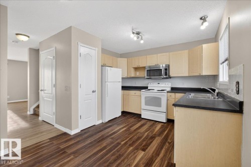 40 Birchglen Crescent, Leduc, AB - Indoor Photo Showing Kitchen With Double Sink