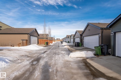 View of road with a residential view - 3221 Cherry Cres Sw, Edmonton, AB - Outdoor With Exterior