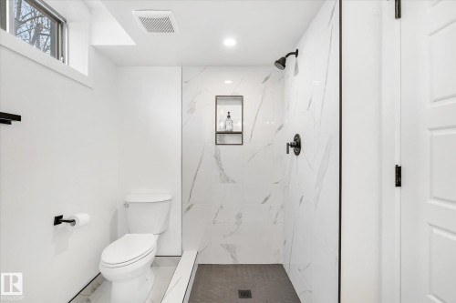 Full bathroom featuring a marble finish shower and recessed lighting - 4120 108 Street, Edmonton, AB - Indoor Photo Showing Bathroom