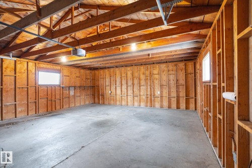 Garage with a garage door opener - 4120 108 Street, Edmonton, AB - Indoor Photo Showing Basement