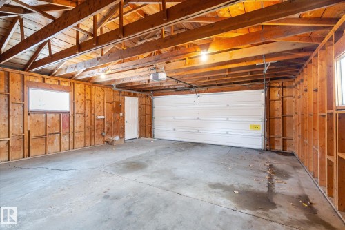 Garage featuring a garage door opener - 4120 108 Street, Edmonton, AB - Indoor Photo Showing Garage
