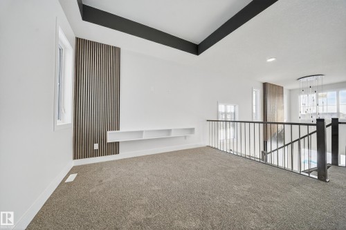 437 Crystal Creek Link, Leduc, AB - Indoor Photo Showing Other Room