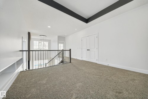 437 Crystal Creek Link, Leduc, AB - Indoor Photo Showing Other Room