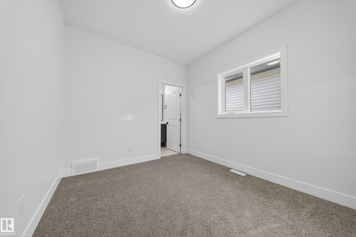 437 Crystal Creek Link, Leduc, AB - Indoor Photo Showing Other Room