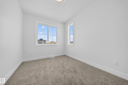 437 Crystal Creek Link, Leduc, AB - Indoor Photo Showing Other Room