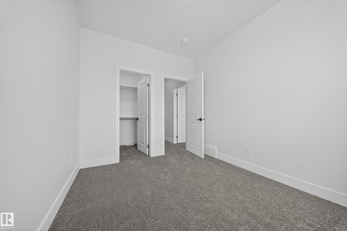 437 Crystal Creek Link, Leduc, AB - Indoor Photo Showing Other Room