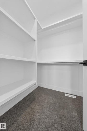 437 Crystal Creek Link, Leduc, AB - Indoor With Storage
