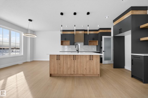 437 Crystal Creek Link, Leduc, AB - Indoor Photo Showing Kitchen With Upgraded Kitchen