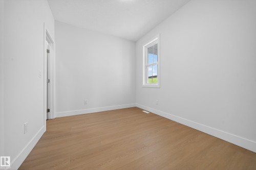 437 Crystal Creek Link, Leduc, AB - Indoor Photo Showing Other Room