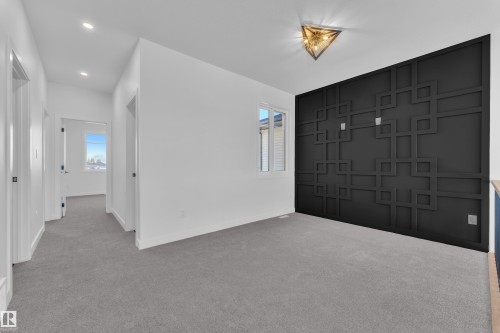 Foyer entrance with carpet and recessed lighting - 38 Grayson Green, Stony Plain, AB - Indoor Photo Showing Other Room