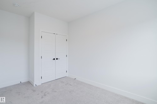 4 Meadowgrove Landing, Spruce Grove, AB - Indoor Photo Showing Other Room