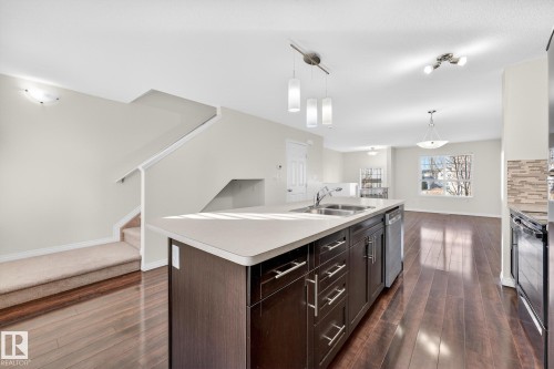 10 4825 Terwillegar Common, Edmonton, AB - Indoor Photo Showing Kitchen With Double Sink