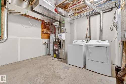 10 4825 Terwillegar Common, Edmonton, AB - Indoor Photo Showing Laundry Room