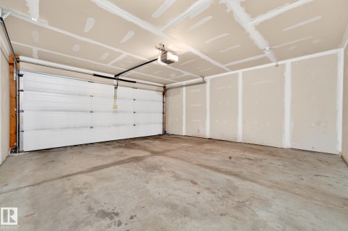 10 4825 Terwillegar Common, Edmonton, AB - Indoor Photo Showing Garage