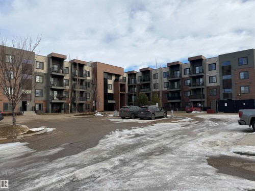 View of apartment building / complex with uncovered parking - 417 1004 Rosenthal Boulevard, Edmonton, AB - Outdoor With Balcony With Facade