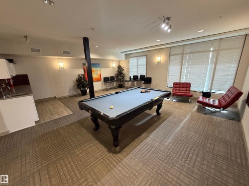 Playroom featuring billiards, a textured ceiling, and recessed lighting - 417 1004 Rosenthal Boulevard, Edmonton, AB - Indoor Photo Showing Other Room