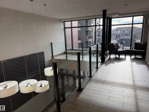 Common area featuring expansive windows - 417 1004 Rosenthal Boulevard, Edmonton, AB - Indoor