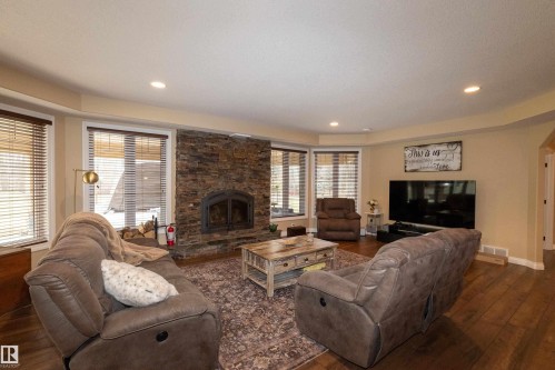 #14 52001 Rge Road 275, Rural Parkland County, AB - Indoor Photo Showing Living Room With Fireplace