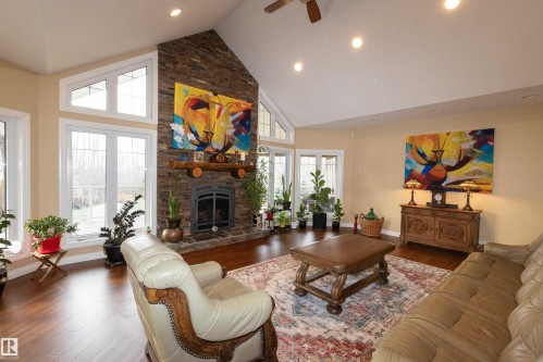 #14 52001 Rge Road 275, Rural Parkland County, AB - Indoor Photo Showing Living Room With Fireplace