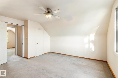 Bonus room with lofted ceiling, light colored carpet, and ceiling fan - 12232 135 Street, Edmonton, AB - Indoor Photo Showing Other Room