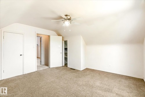 Bonus room with vaulted ceiling, ceiling fan, and light carpet - 12232 135 Street, Edmonton, AB - Indoor Photo Showing Other Room