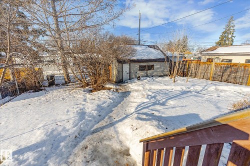 Yard covered in snow featuring an outdoor structure - 12232 135 Street, Edmonton, AB - Outdoor