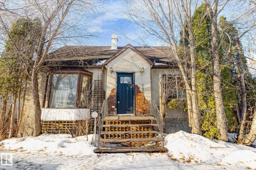 View of front of property with a chimney and a shingled roof - 12232 135 Street, Edmonton, AB - Outdoor