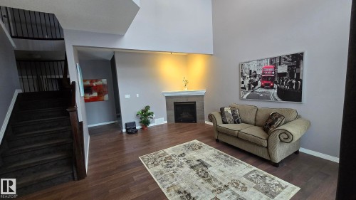 1325 Adamson Drive, Edmonton, AB - Indoor Photo Showing Living Room With Fireplace