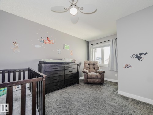 109 Rue Moreau, Beaumont, AB - Indoor Photo Showing Bedroom