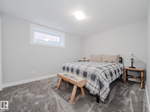 109 Rue Moreau, Beaumont, AB - Indoor Photo Showing Bedroom