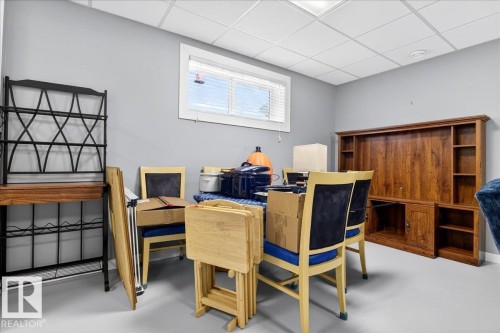 Office featuring a paneled ceiling and concrete flooring - 5019 48 Avenue, Chipman, AB - Indoor Photo Showing Office