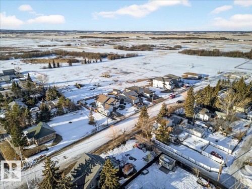 Snowy aerial view with a residential view - 5019 48 Avenue, Chipman, AB - Outdoor With View