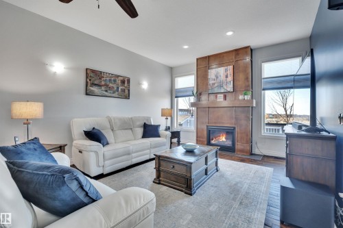 99 Shores Drive, Leduc, AB - Indoor Photo Showing Living Room With Fireplace