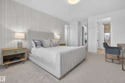 Carpeted bedroom with ensuite bathroom - 