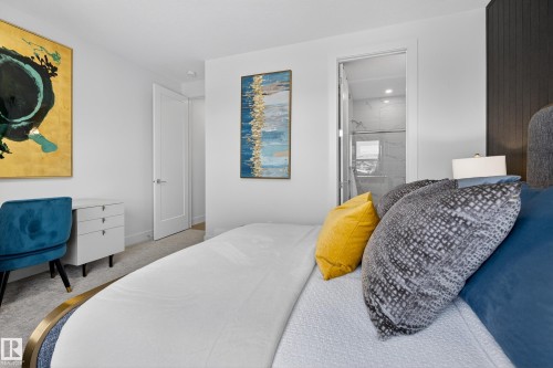 Carpeted bedroom featuring ensuite bathroom - 1132 Wahl Place, Edmonton, AB - Indoor Photo Showing Bedroom