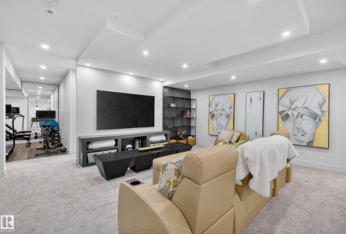 Living room with light carpet and recessed lighting - 1132 Wahl Place, Edmonton, AB - Indoor