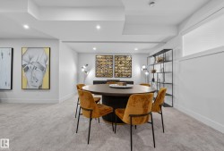 Dining space featuring light carpet and recessed lighting - 
