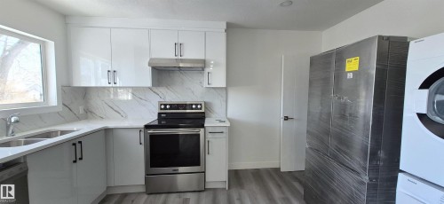 12746 116 Street, Edmonton, AB - Indoor Photo Showing Kitchen With Double Sink