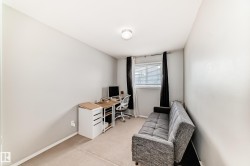 Home office with carpet and baseboards - 